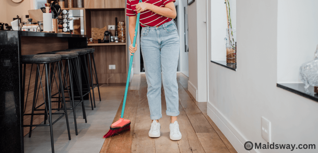 sweeping the floor